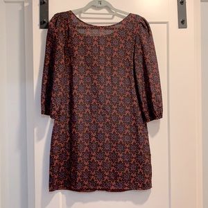 Paraella Boutique Dress with Zipper Detail up back and puff sleeve, size M.